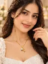 Elegant Gold Pendant Portrait.webp
