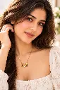 Radiant Model Wearing Heart Pendant.webp